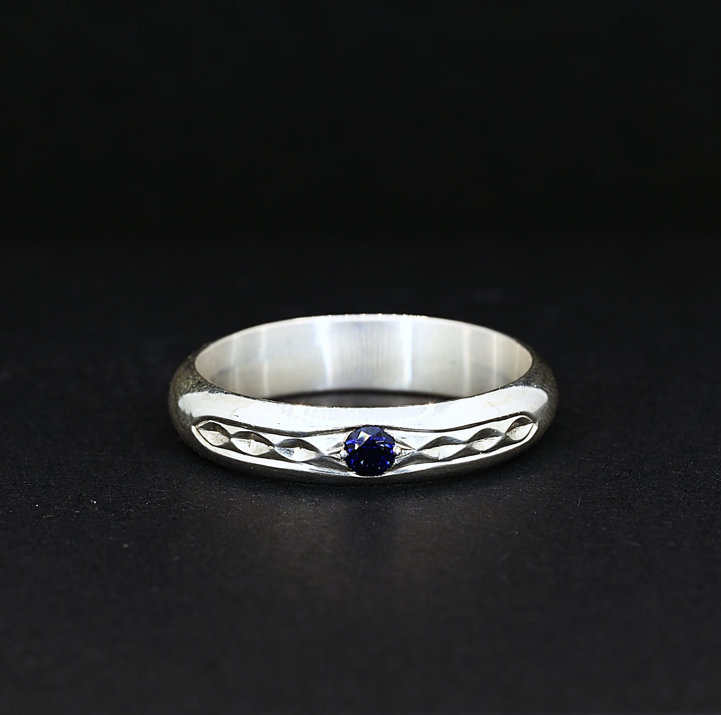 Engraved geometric sapphire ring jewellery