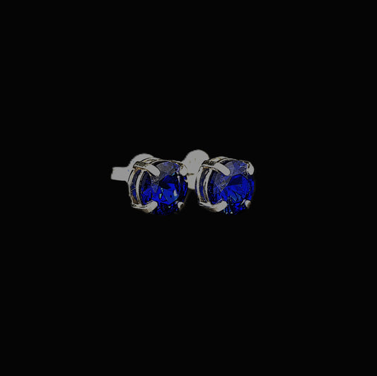 Claw set, blue spinel and sterling silver stud earrings