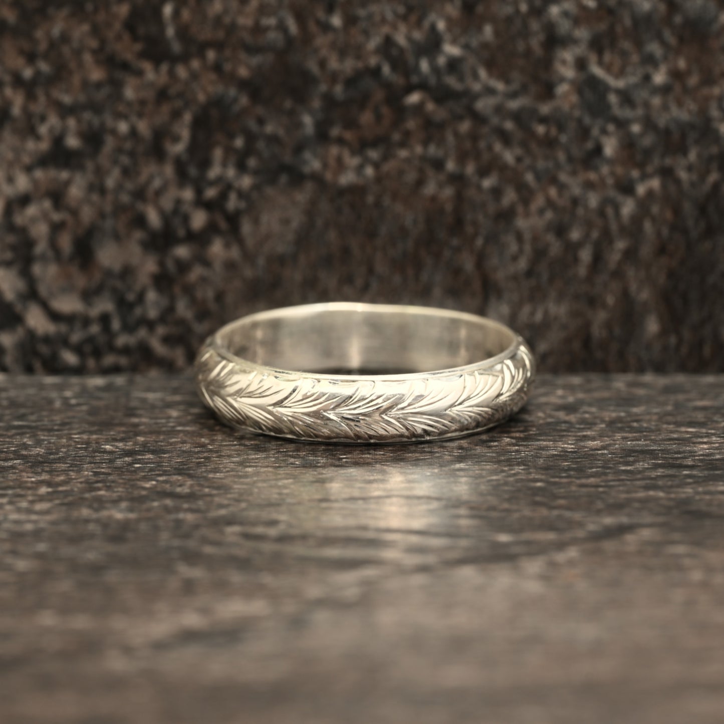 Sterling silver ring with hand‑engraved Germanic wheat design