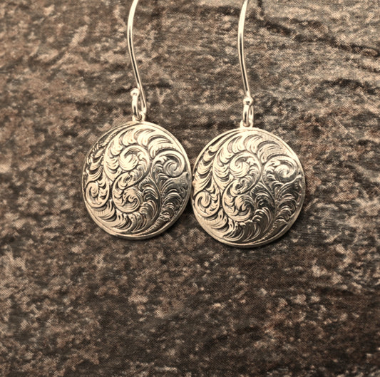 Hand-engraved sterling silver earrings featuring traditional English Scroll design