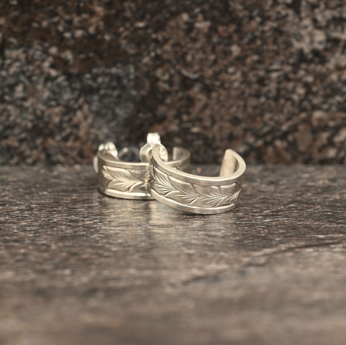 Sterling silver huggie earrings with hand‑engraved wheat motif