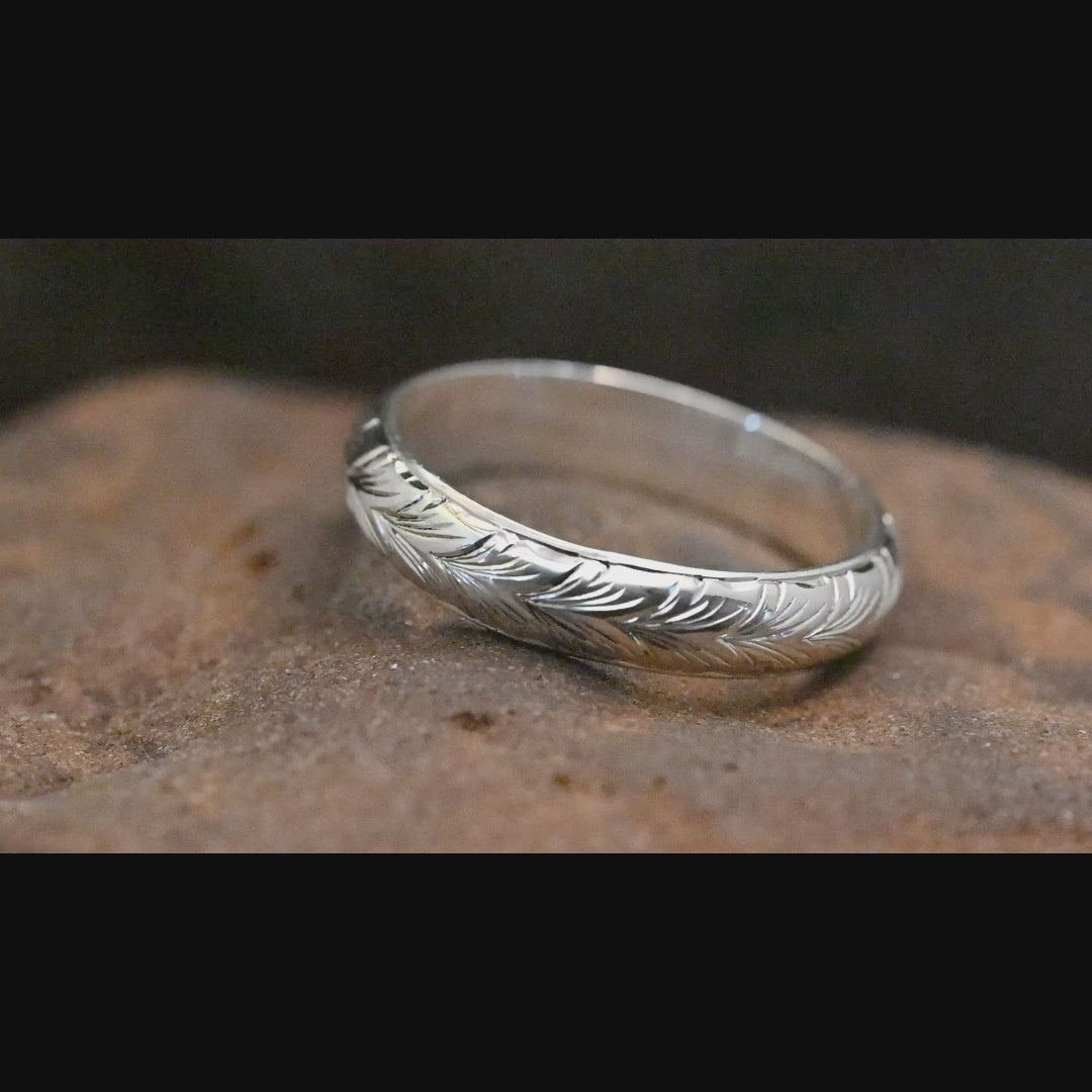 Sterling silver ring with hand‑engraved Germanic wheat design